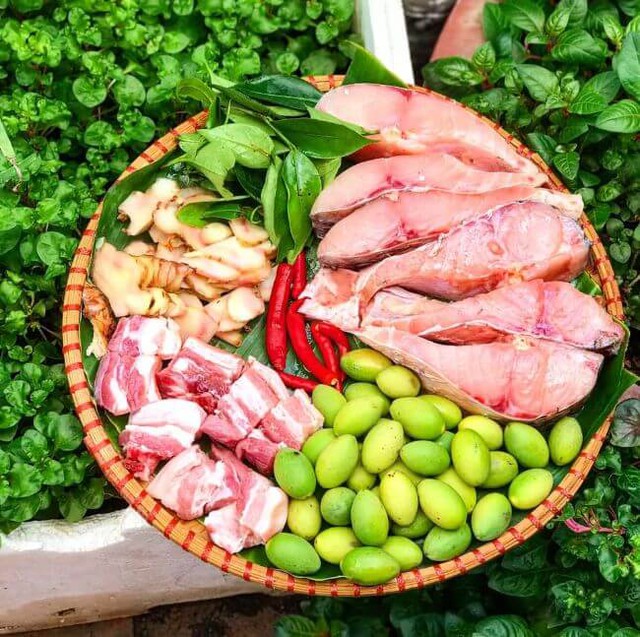 Cá trắm kho trám xanh: Món ngon đậm hồn quê Bắc bộ, chinh phục thực khách bằng hương vị truyền thống mộc mạc, tinh tế- Ảnh 1. Cá trắm kho trám xanh: Món ngon đậm hồn quê Bắc bộ, chinh phục thực khách bằng hương vị truyền thống mộc mạc, tinh tế- Ảnh 1.