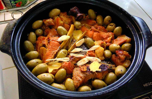Cá trắm kho trám xanh: Món ngon đậm hồn quê Bắc bộ, chinh phục thực khách bằng hương vị truyền thống mộc mạc, tinh tế- Ảnh 3. Cá trắm kho trám xanh: Món ngon đậm hồn quê Bắc bộ, chinh phục thực khách bằng hương vị truyền thống mộc mạc, tinh tế- Ảnh 3.